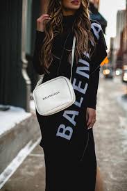Fashion Blogger Mia Mia Mine Wearing A White Balenciaga Camera Bag Street Style Bags Fashion Outfits