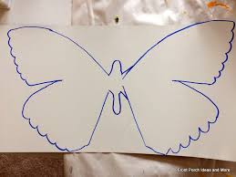 Butterfly Drawings Painted Metal Butterflies Take the marker and put line along the edges and vine lines on the paper wings. front porch ideas and more
