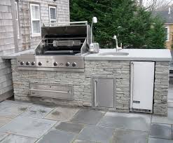 outdoor kitchen island with sink and