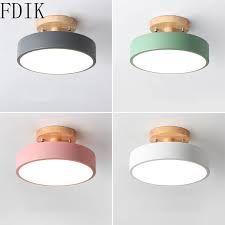 Bathroom light fixtures tend to have components that are metal or at least exude a metallic select bathroom light fixtures have adjustability features in which the bulbs attach to tilt or swivel mounts. Macaron Wooden Led Ceiling Light Modern Round Metal Ceiling Lamp For Home Bedroom Corridor Bathroom Loft Decor Lighting Fixtures Ceiling Lights Aliexpress