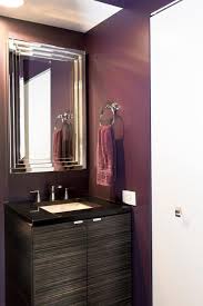 Welcome to our purple primary bathrooms photo gallery showcasing multiple purple primary bathroom design ideas of all types. Bathroom Plum Perfect Bathroom Color Dark Bathroom Purple Bathroom Metal Mirror Frame Ch Dark Purple Bathroom Purple Bathroom Paint Purple Bathroom Decor