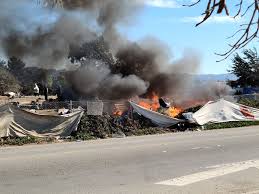 A group of temporary living quarters and/or other temporary structures. Fire Underway At Berkeley Homeless Camp Near Seabreeze Market