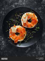 I used my easy breakfast pizza dough recipe and topped it with red onion and everything bagel seasoning, then baked it in the oven and finished it with a they are basically flattened out bagels, it's the same dough as my bagel recipe just made into a flatbread. Smoked Salmon Bagel Image Photo Free Trial Bigstock