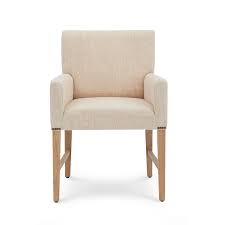 While natural textures like raffia, rattan, and wicker, which adorn accent pieces, ground the collection. Shoreditch Fabric Dining Chair With Arms Neptune