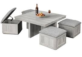 If you already have suede furniture, it's a good idea to consider whether more suede would cause the room to look a bit too bold. Elements Uster Cocktail Table With Four Storage Ottomans