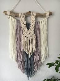 Wall hangings are all the rage again. Boho Yarn And Macrame Wall Hanging Nursery Wall Decor Macrame Wall Hanging Boho Yarn Macrame Wall Art