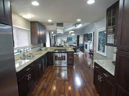 You'll absolutely adore these 11 amazing dark woods. Stylish Kitchen With Dark Wood Cabinets And Flooring Hgtv