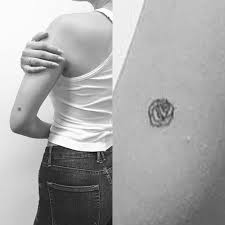 Geometrical shape and star tattoo design on the outer surface of the elbow. Bella Hadid Rose Elbow Tattoo Steal Her Style