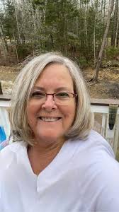 What hair style suits a 62 year old woman with silver hair and thinning  regrowth?