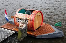 It is a common problem that when these original old boats were put in the water after a winter, it would leak for a while until the planks swelled and hopefully sealed up the leaks. A Barrel Boat Barrel Boat Photo