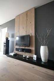 Wandpaneel Aus Holz Hinter Dem Fernseher Im Wohnzimmer Holzwand Wohnzimmer Wandpaneele Wohnen