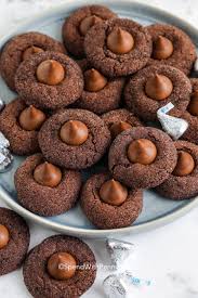 Unwrap and place a hershey kiss onto the center of each pretzel piece. Hershey Kiss Cookies Chocolate Sugar Cookies Spend With Pennies