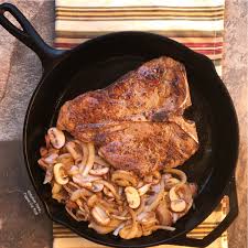 Place the steak into the skillet and cook until it's easily moved. Steak Mushroom Onion Skillet Flipped Out Food