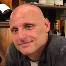 Michael Strine, accomplished executive in COO and CFO roles across the  government, education, health and financial services sector, speaks with  HCM Capstone Seminar students.