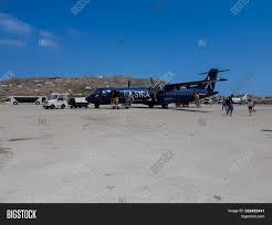 The earliest flight departs at 12:40, the last flight departs at 22:25. Mykonos Greece Image Photo Free Trial Bigstock