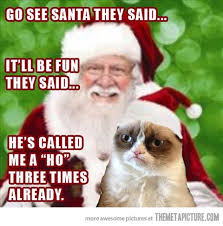 Grumpy Cat Sits On Santa S Lap Grumpy Cat Humor Grumpy Cat Christmas Grumpy Cat Quotes
