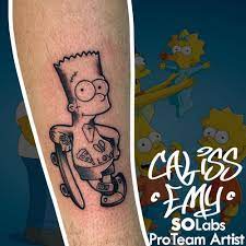 The most common cartoon tattoos for women are disney characters. Cartoon Tattoo On Hand Cartoon Tattoos Cartoon Character Tattoos Blackwork Tattoo