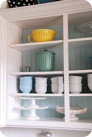 It's also helpful to remove your cabinet doors to make it easier to paint inside them. Create A Kitchen Focal Point With A Beadboard Cabinet Backsplash For Less Than 10 Open Kitchen Cabinets Kitchen Cabinet Doors New Kitchen Cabinets