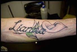Most people would rather have names printed on their skins than any other design. 130 Amazing Name Tattoos Designs And Ideas Awesome Lily Tattoo Name Tattoo Designs Name Tattoos