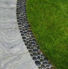Edging your gardens with river stones is a great way to give them a fabulous makeover. Diy Garden Edging Bob Vila