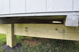 I will hand dig 8 24x24x8 footings pour level with quickrete (cant get a truck in there) and dry stack 8x16 block up to floor level then build the floor. How To Build A Post Beam Shed Foundation On A Slope Post And Beam Shed Post And Beam Shed Foundation Ideas