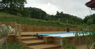 Piscine Enterree Sur Terrain En Pente 8 Jpg 566 291 Amenagement Jardin En Pente Piscine Enterree Piscine Hors Sol Bois