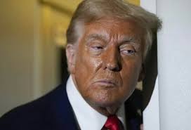 Donald Trump practically always wears heavy bronzer, but he often goes  makeup-free for his golfing events, and his appearance looks tired and old  without it.