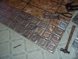 Press Aluminum Cans Into Ceiling And Wall Tiles Wall Tiles Aluminum Cans Metal Tile
