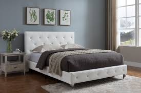 Featuring strong, solid pine wood and ten supporting slats, this bed is built to last, ensuring it will accompany you for many years. Cora Black Or White Transitional Upholstered Faux Leather Tufted Platform Slat Bed Crysta Upholstered Platform Bed Headboards For Beds Headboard And Footboard