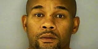 Man charged with credit-union robbery fires defender, but trial still on