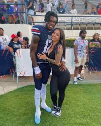 Who is Travis Hunter's fiancée, Leanna Lenee – and why did he rush to her  defence? The Colorado Buffaloes NFL star called out critics who said she  looked 'miserable' after his Heisman