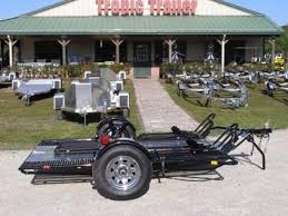 The dual rail trailer shines as a light of beauty and function. 2020 Kendon Dual Ride Up Srl Folding Motorcycle Trailer Tropic Trailers
