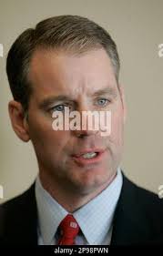 Former United States Representative Kevin Yoder's wife, Brooke Yoder, and  daughters Eloise and Caroline pay their respects as the body of former US  Senator Bob Dole (Republican of Kansas) who died on