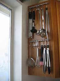 Kitchen Utensils Storage Using Cabinet Handles Get Rid Of That Dangerous And Daunting Utensil Drawe Small Kitchen Storage Kitchen Utensil Storage Tiny Kitchen