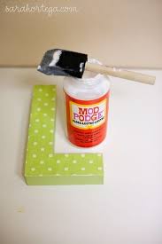 I found this project and pinned it before i even realized it was made of newspaper and mod podge! Sarah Ortega Diy Letter Art Paper Mache Letters Diy Letter Paper Mache Crafts