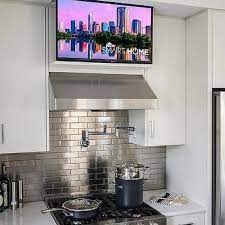 Flatscreen Tv Over Refrigerator Design