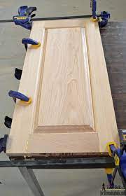 Clamp flat and allow the glue to dry. Remodelaholic Raised Panel Cabinet Doors Diy Cabinet Doors Raised Panel Cabinet Doors Raised Panel Cabinets