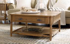 A coffee table with storage can help reduce clutter by adding extra space for remotes, throw pillows, magazines, and toys. Coffee Tables End Tables Side Tables Andreas Furniture Ohio
