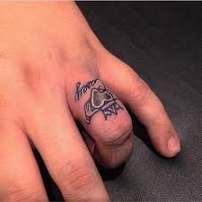 Traditional Irish Claddagh Ring Tattoo Design On The Finger Tattoo Wedding Rings Ring Tattoos Wedding Ring Tattoo