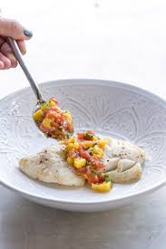 Top fish fillets with salsa, drizzle with the juice of ½ lime and serve. Easy Fish With Mango Salsa Garlic Matters
