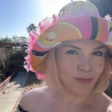 I have wanted to own something in a Pucci print for my entire little life.  The swirls, they have always spoken to me! I am also a HUGE fan of the work