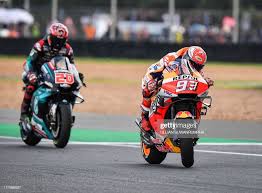 Repsol Honda Team Spanish Rider Marc Marquez R Arrives At The Finish Line Ahead Of Petronas Yamaha Srt French Rider Fabio Qu Motogp Race Marc Marquez Marquez