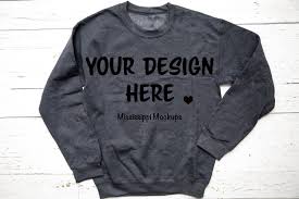 Hispanic woman wearing a crewneck sweatshirt mockup and a gray beanie. Dark Heather Gildan 18000 Unisex Sweatshirt Mockup Jumper Flat Lay On Plain White Background No Props Art Collectibles Color Trustalchemy Com