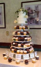 2 Tier Cake With 13 Dozen Assorted Cupcakes For The Guests Wedding Cakes With Cupcakes Tiered Wedding Cake 2 Tier Cake