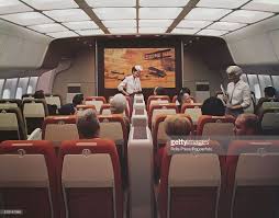 View Of Passengers And Flight Attendants Inside A Mock Up Interior Of Flight Attendant Passenger Vintage Airlines