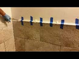 Other tools and materials to complete the installation will include: How To Install Mosaic Tile In Bathroom Shower Part 2 Travertine Pencils Liners Installation Youtube