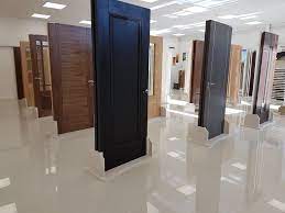 Solid wood is a popular material for modern interior doors, as it provides a classic and elegant look with tried and true stability. Doras Amsterdam Door At Our Tramore Showrooms Showroom Design Door Design Store Door