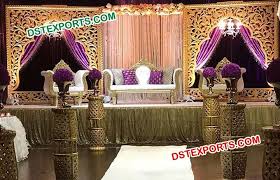 From going all out to recreate the mughal era at your reception to a quietly elegant fusion of mughal and modern styles, we've got the formula down for you! Royal Arch Wedding Stage Dstexports