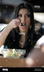 Kim Kardashian and sisters Khloe and Kourtney enjoy a meal at Toast. After  eating, the girls touch up their makeup before heading to the Hillary Rush  boutique for a bit of shopping.