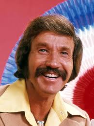 Marty Robbins' music often explored themes of love, heartache, and  nostalgia, and "Am I That Easy to Forget" is a prime example of his ability  to convey deep emotions through his music.